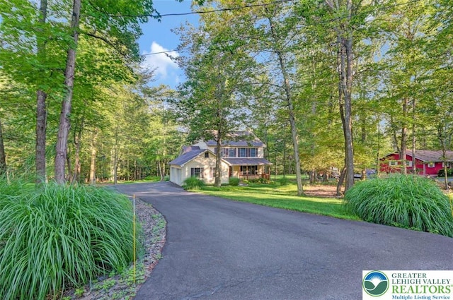 119 Savage Trl, Smithfield Twp, PA 18301 - view of front of property featuring a front lawn and a garage