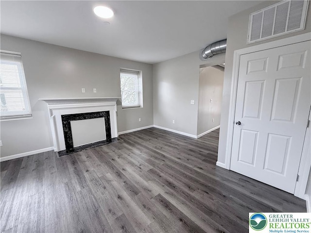 801 W Broad, Bethlehem City, PA 18018 - unfurnished living room featuring wood finished floors and a fireplace