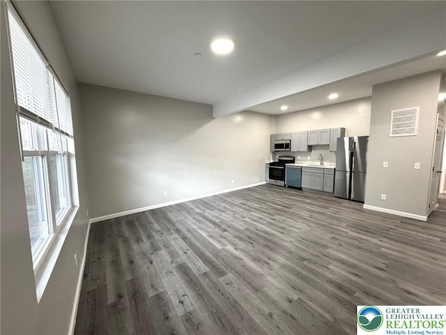 801 W Broad, Bethlehem City, PA 18018 - unfurnished living room with dark wood-type flooring and recessed lighting