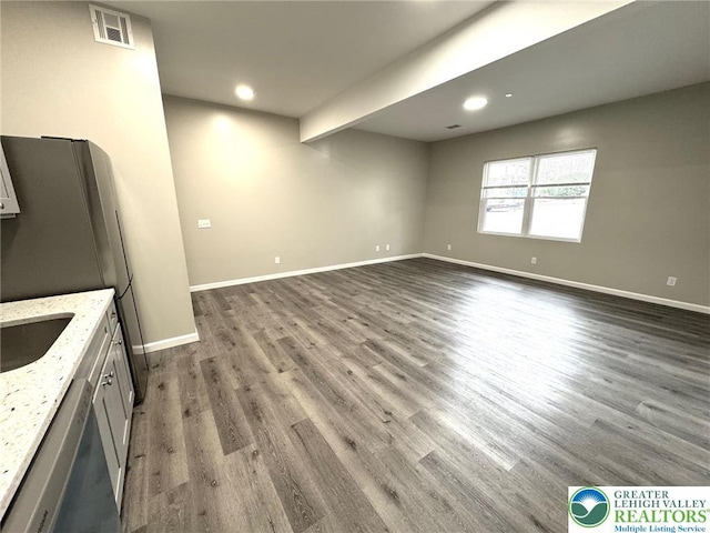 801 W Broad, Bethlehem City, PA 18018 - unfurnished living room featuring dark wood-style floors and recessed lighting