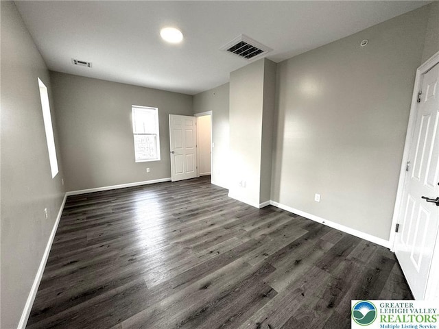 801 W Broad, Bethlehem City, PA 18018 - unfurnished bedroom featuring dark wood finished floors and baseboards
