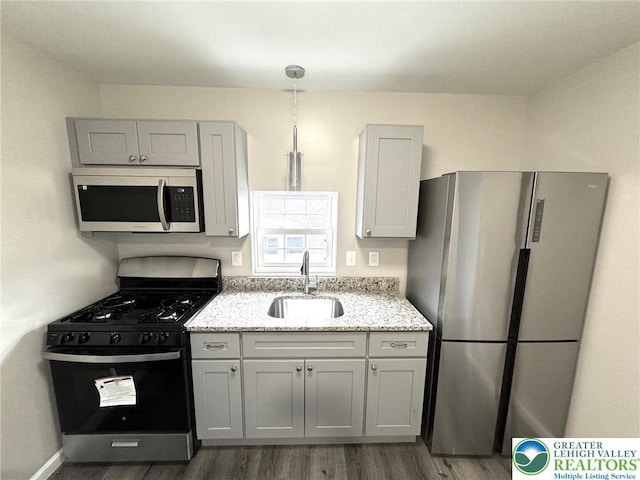 801 W Broad, Bethlehem City, PA 18018 - kitchen with stainless steel appliances, gray cabinetry, and wood finished floors