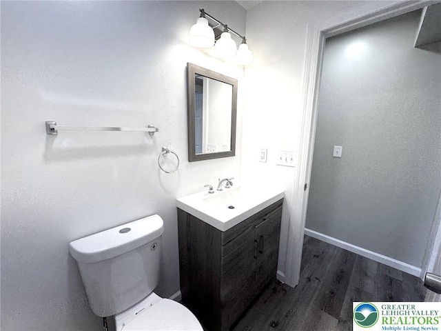 801 W Broad, Bethlehem City, PA 18018 - half bathroom featuring vanity and wood finished floors