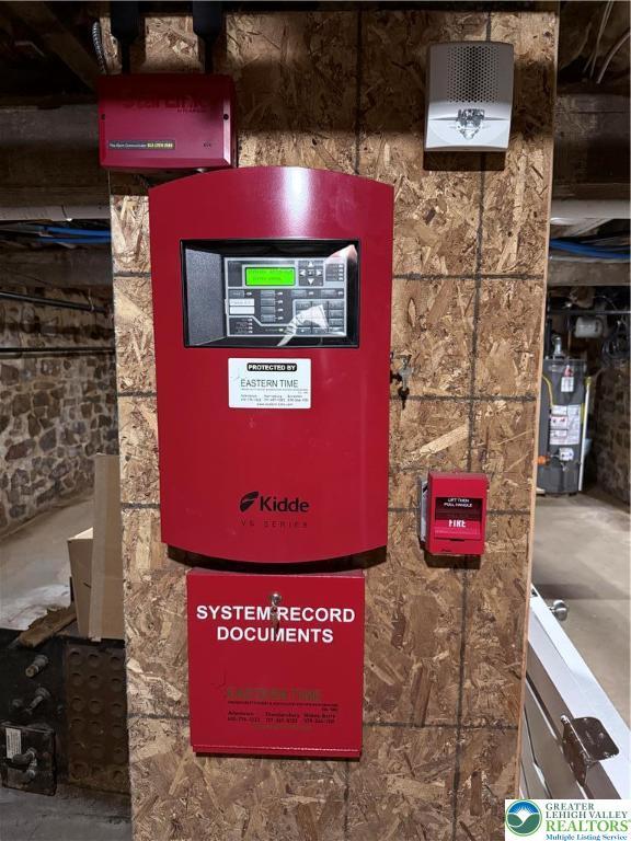 801 W Broad, Bethlehem City, PA 18018 - basement view of gas water heater and stone siding
