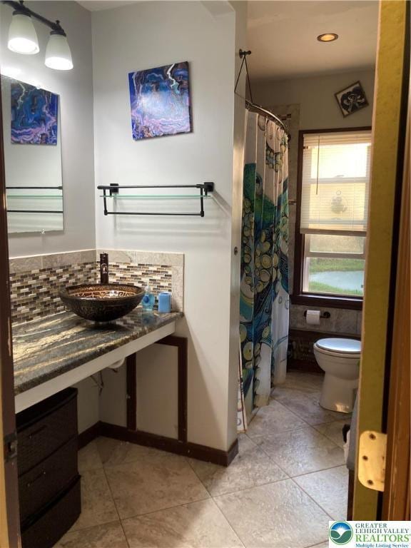 5984 Rte 412, Springfield Twp, PA 18077 - bathroom featuring tile patterned flooring, recessed lighting, curtained shower, and vanity