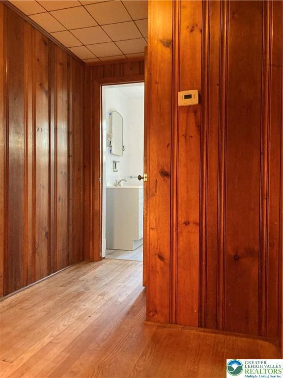 5984 Rte 412, Springfield Twp, PA 18077 - corridor with wood finished floors and wood walls