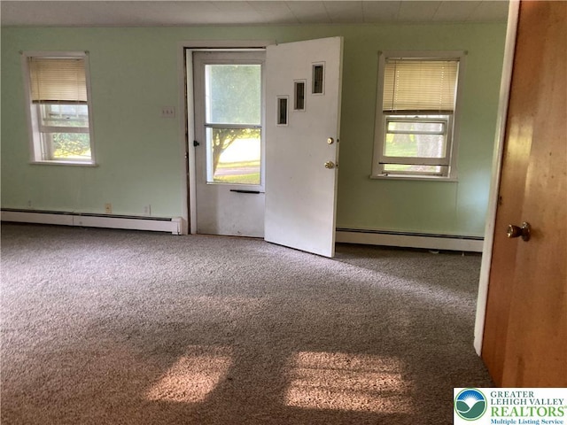 5984 Rte 412, Springfield Twp, PA 18077 - carpeted spare room with a baseboard radiator and plenty of natural light