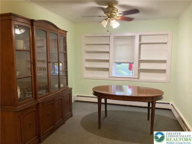 5984 Rte 412, Springfield Twp, PA 18077 - carpeted dining space featuring ornamental molding, built in features, ceiling fan, and baseboard heating