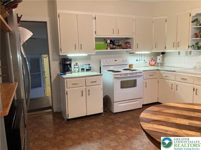 5984 Rte 412, Springfield Twp, PA 18077 - kitchen featuring electric stove, open shelves, light countertops, and white cabinets