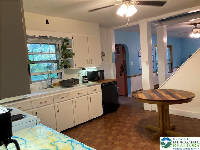 5984 Rte 412, Springfield Twp, PA 18077 - kitchen with a ceiling fan, white cabinets, black appliances, arched walkways, and light countertops