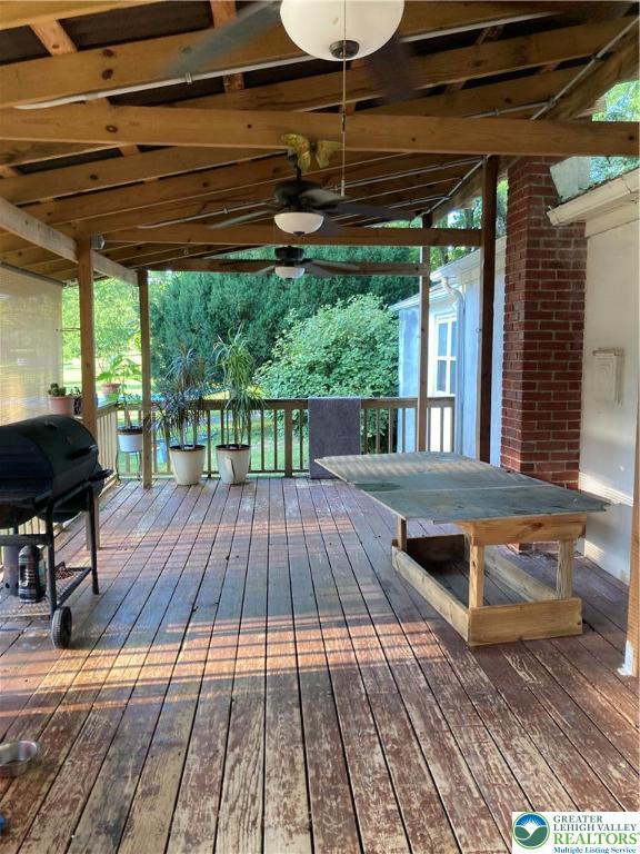 5984 Rte 412, Springfield Twp, PA 18077 - wooden terrace featuring grilling area, ceiling fan, and outdoor dining area