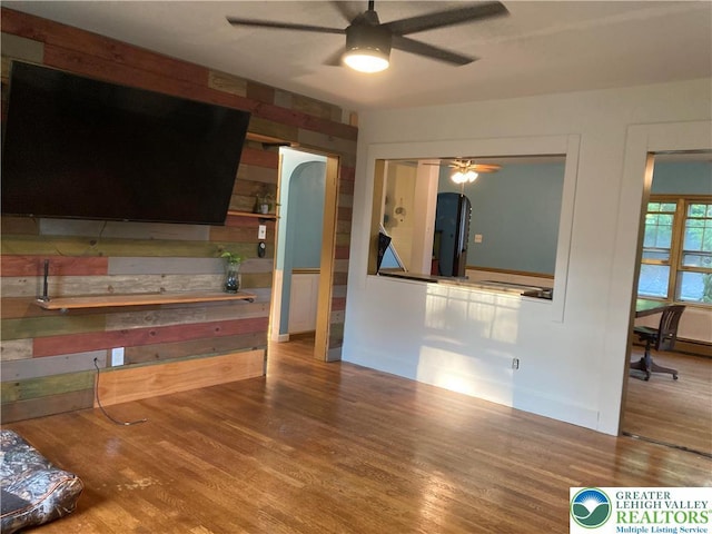 5984 Rte 412, Springfield Twp, PA 18077 - unfurnished living room with ceiling fan, wood finished floors, and arched walkways
