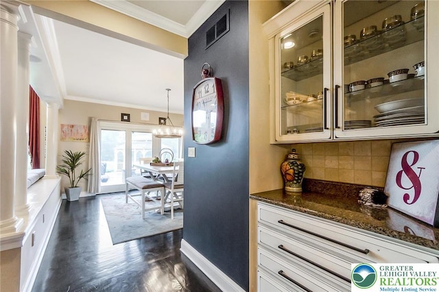 4260 W Wyndemere Cir, Lowhill Twp, PA 18078 - bar featuring ornamental molding, backsplash, dark wood-style floors, and ornate columns