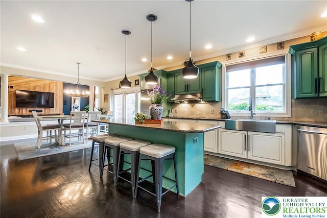 4260 W Wyndemere Cir, Lowhill Twp, PA 18078 - kitchen featuring stainless steel dishwasher, healthy amount of natural light, green cabinets, crown molding, and tasteful backsplash