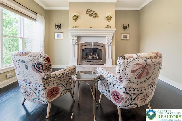 4260 W Wyndemere Cir, Lowhill Twp, PA 18078 - living room featuring dark wood finished floors, crown molding, and a glass covered fireplace