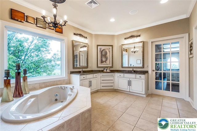 4260 W Wyndemere Cir, Lowhill Twp, PA 18078 - full bathroom featuring a chandelier, double vanity, a jetted tub, tile patterned floors, and ornamental molding