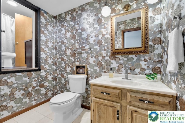 8555 Mohr Ln, Weisenberg Twp, PA 18051 - bathroom with wallpapered walls, vanity, and tile patterned flooring