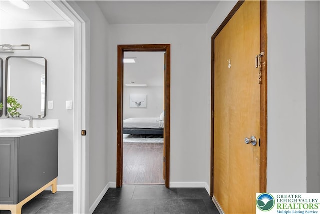 8555 Mohr Ln, Weisenberg Twp, PA 18051 - hall with baseboards and dark tile patterned flooring
