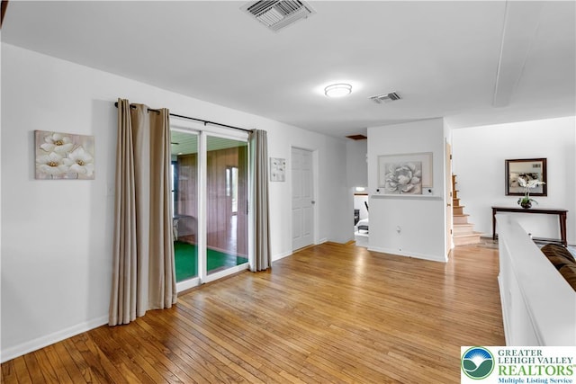 8555 Mohr Ln, Weisenberg Twp, PA 18051 - unfurnished room featuring light wood-type flooring and stairway