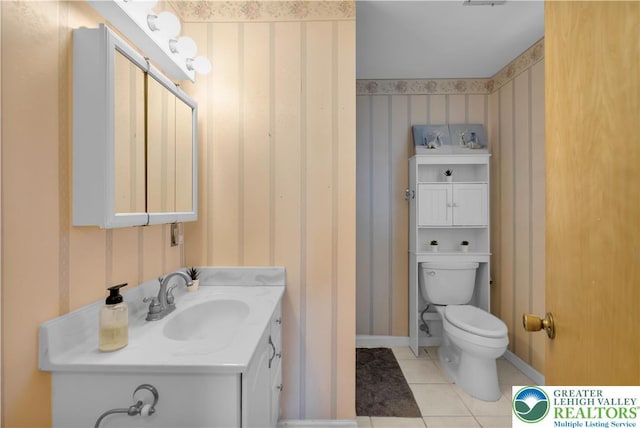 8555 Mohr Ln, Weisenberg Twp, PA 18051 - bathroom featuring wallpapered walls, tile patterned floors, and vanity