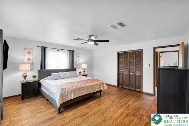 8555 Mohr Ln, Weisenberg Twp, PA 18051 - bedroom with light wood-style flooring, a ceiling fan, and a closet