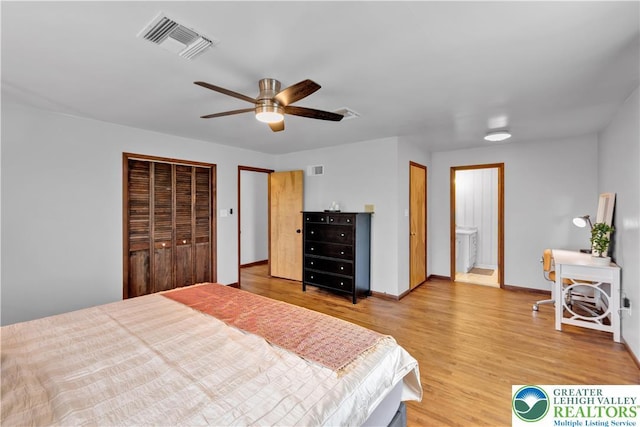 8555 Mohr Ln, Weisenberg Twp, PA 18051 - bedroom with light wood-style floors, ensuite bathroom, multiple closets, and ceiling fan