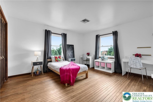 8555 Mohr Ln, Weisenberg Twp, PA 18051 - bedroom with hardwood / wood-style flooring and a closet