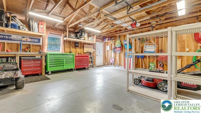 5129 3rd St, Whitehall Twp, PA 18052 - garage featuring a garage door opener