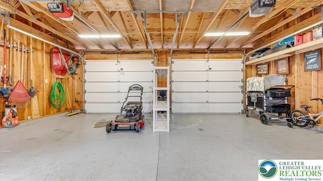 5129 3rd St, Whitehall Twp, PA 18052 - garage featuring a garage door opener