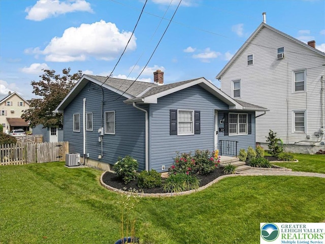 5129 3rd St, Whitehall Twp, PA 18052 - view of side of home with a cooling unit and a chimney