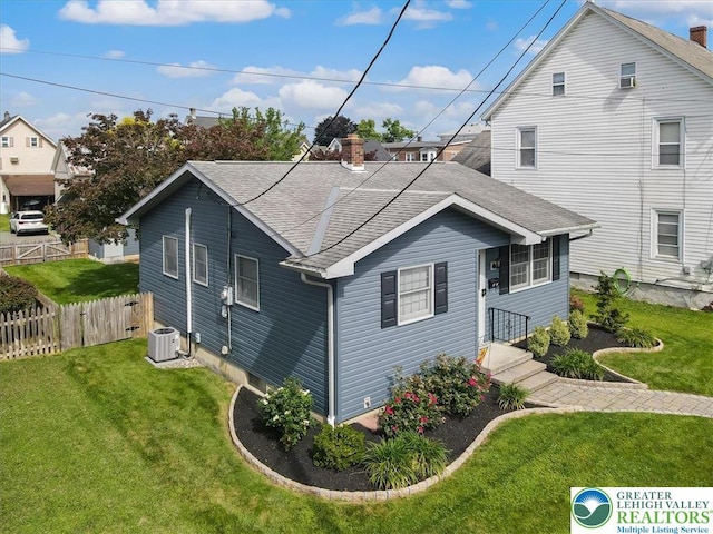 5129 3rd St, Whitehall Twp, PA 18052 - view of property exterior with a shingled roof and a chimney