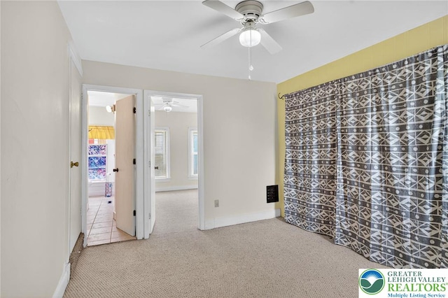 22 N Warren St, Easton, PA 18042 - empty room with a ceiling fan and carpet floors