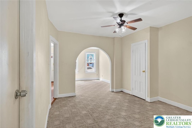 22 N Warren St, Easton, PA 18042 - spare room with ceiling fan, arched walkways, and carpet floors