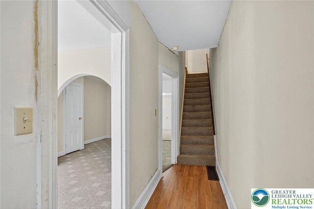 22 N Warren St, Easton, PA 18042 - staircase with arched walkways and wood finished floors