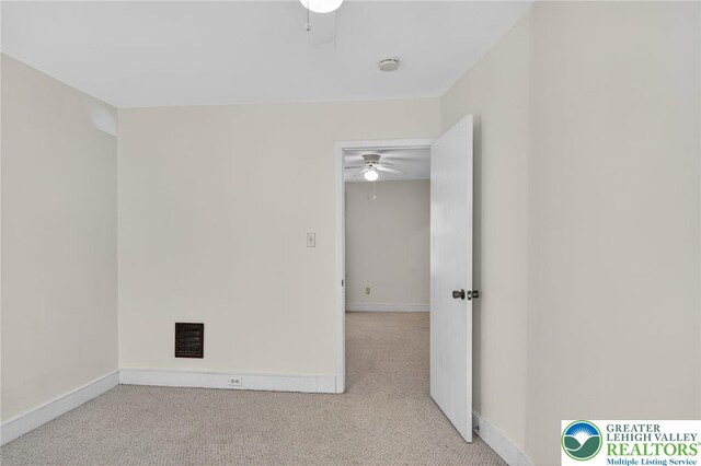 22 N Warren St, Easton, PA 18042 - carpeted empty room with ceiling fan and a smoke detector