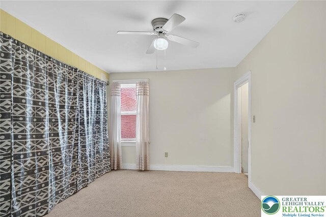 22 N Warren St, Easton, PA 18042 - empty room with ceiling fan, carpet, and a smoke detector