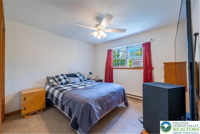 2175 Village Rd, Chestnuthill Twp, PA 18330 - bedroom featuring a baseboard heating unit, carpet, and ceiling fan