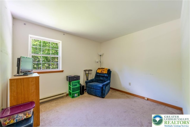 2175 Village Rd, Chestnuthill Twp, PA 18330 - living area featuring a baseboard heating unit and carpet