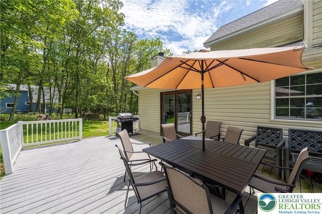 2175 Village Rd, Chestnuthill Twp, PA 18330 - deck featuring outdoor dining area, a grill, and a lawn
