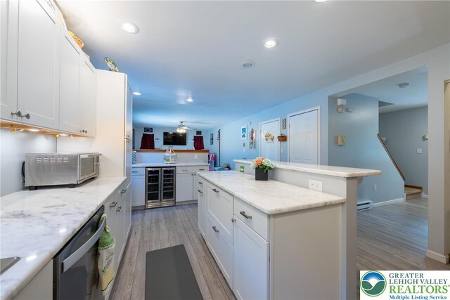 2175 Village Rd, Chestnuthill Twp, PA 18330 - kitchen featuring wine cooler, dishwasher, white cabinetry, light wood finished floors, and recessed lighting