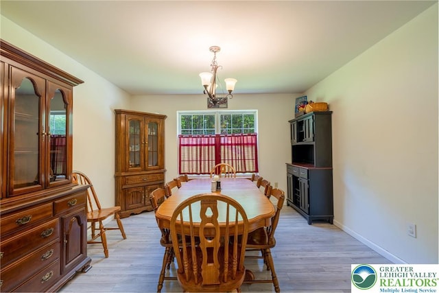 2175 Village Rd, Chestnuthill Twp, PA 18330 - dining space featuring a chandelier and light wood finished floors