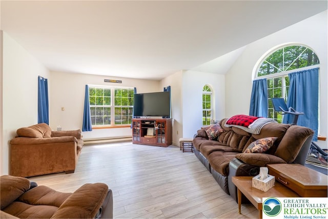 2175 Village Rd, Chestnuthill Twp, PA 18330 - living room with a baseboard radiator, light wood-style floors, and healthy amount of natural light