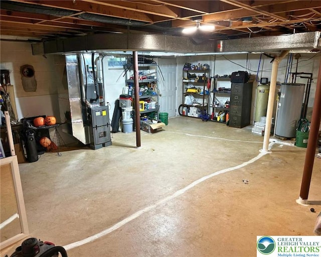 1701 Johns Rd, Chestnuthill Twp, PA 18330 - unfinished basement with water heater, heating unit, and a water softener
