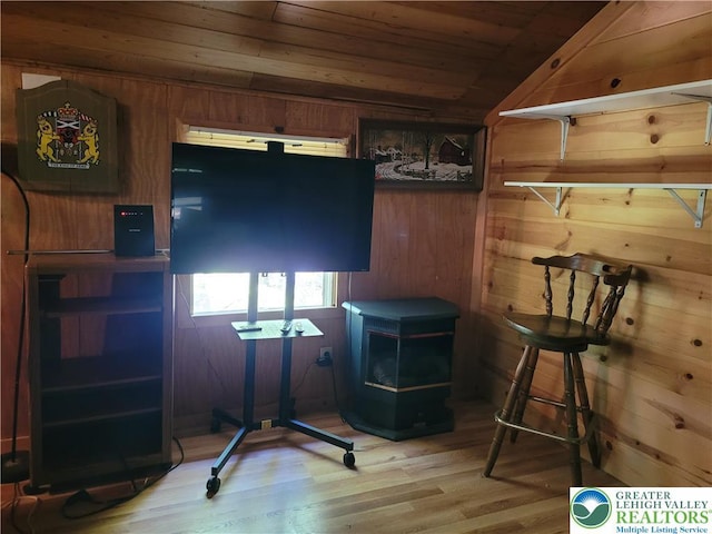 2048 Beaver Run Rd, Tobyhanna Twp, PA 18347 - office area with wood ceiling, wood finished floors, a wood stove, wooden walls, and lofted ceiling