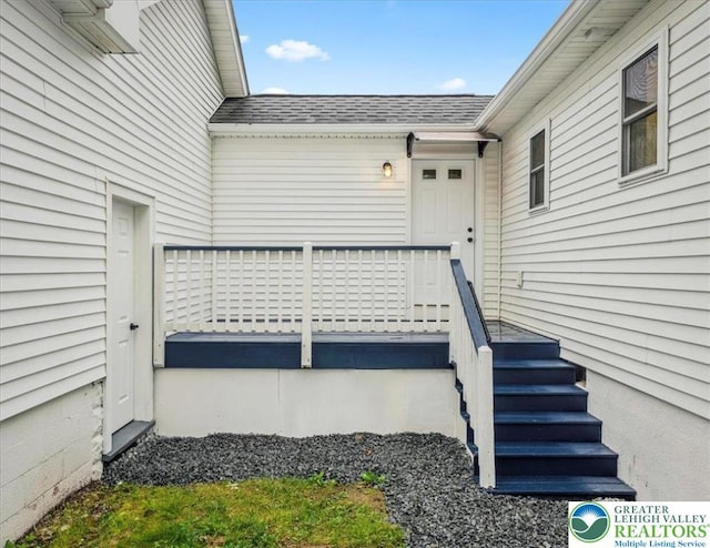428 Shook Ave, Stroud Twp, PA 18360 - view of exterior entry featuring a shingled roof