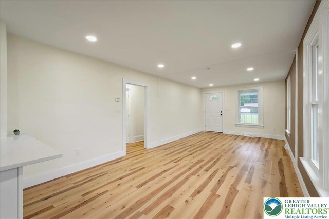 428 Shook Ave, Stroud Twp, PA 18360 - unfurnished living room featuring light wood-type flooring and recessed lighting