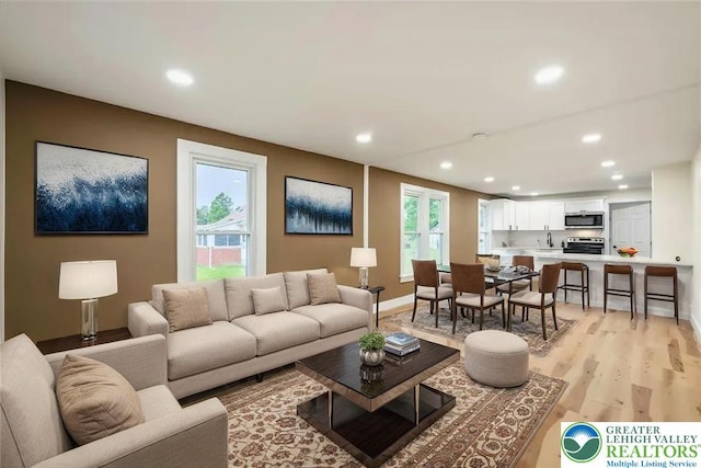 428 Shook Ave, Stroud Twp, PA 18360 - living area with recessed lighting and light wood finished floors