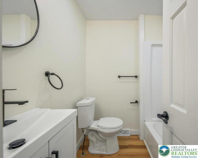 428 Shook Ave, Stroud Twp, PA 18360 - full bathroom featuring wood finished floors and vanity