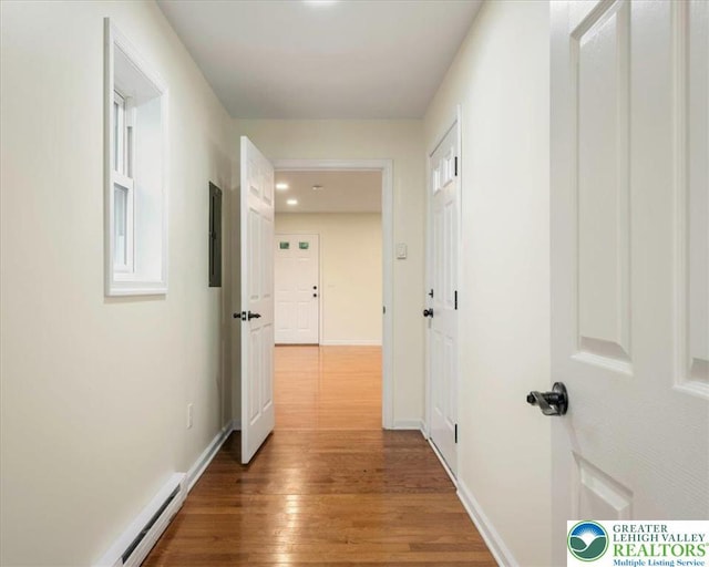 428 Shook Ave, Stroud Twp, PA 18360 - corridor featuring wood finished floors, baseboard heating, and electric panel