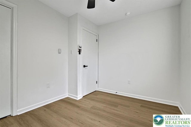 182 Maxatawny Dr, Coolbaugh Twp, PA 18347 - empty room featuring ceiling fan, wood finished floors, and a smoke detector